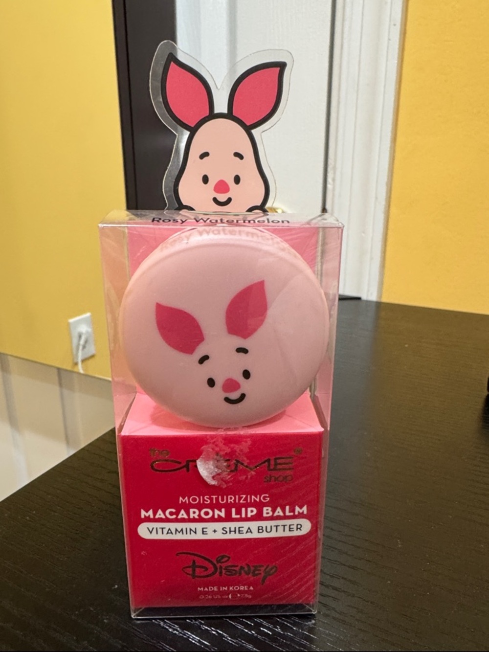 The Crème Shop and Disney featuring piglet - lip balm Rosy watermelon flavor.